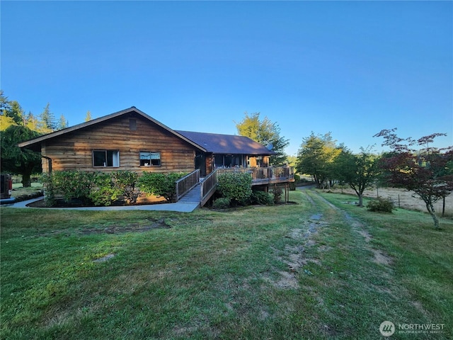 6255 Turkey Hill Rd, Clinton, WA 98236 - view of front of property with a front lawn and a deck