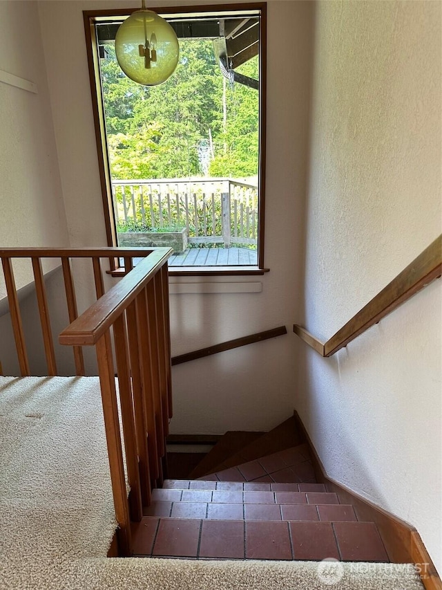 6255 Turkey Hill Rd, Clinton, WA 98236 - stairway with a textured wall and baseboards