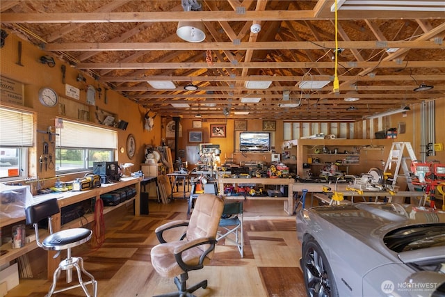 misc room featuring a workshop area