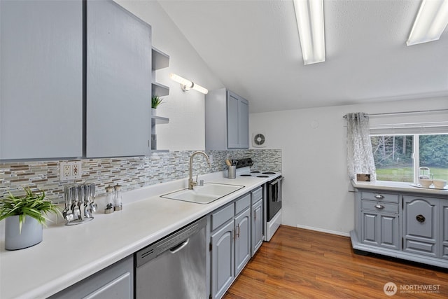 5675 Winona Ln, Langley, WA 98260 - kitchen featuring stainless steel dishwasher, gray cabinetry, a sink, and electric range