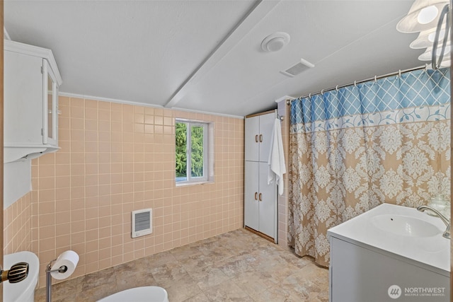 5675 Winona Ln, Langley, WA 98260 - full bath with vanity, tile walls, and visible vents