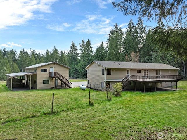 5675 Winona Ln, Langley, WA 98260 - back of house with a wooden deck, a lawn, and stairs