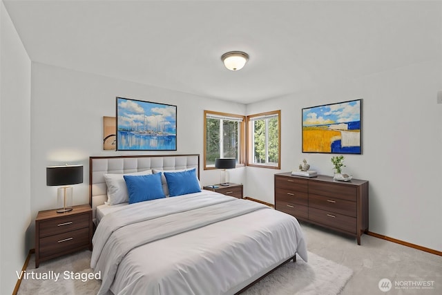 5675 Winona Ln, Langley, WA 98260 - bedroom with baseboards and light carpet