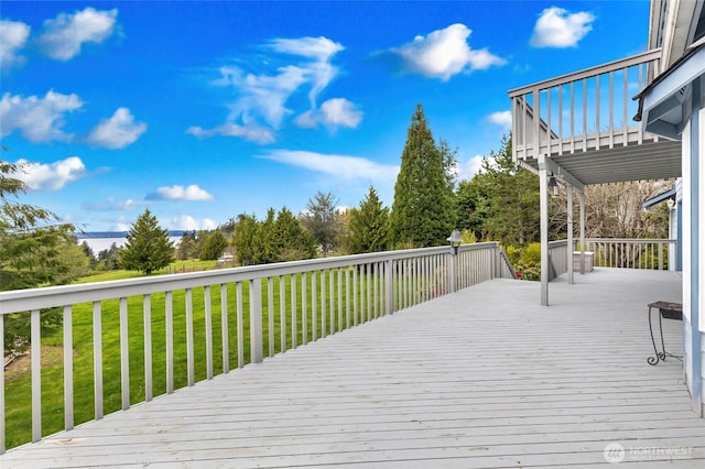 deck featuring a yard