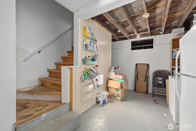 19529 Locust Way, Lynnwood, WA 98036 - unfinished basement featuring stairs and freestanding refrigerator