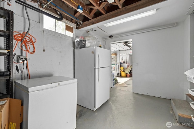 19529 Locust Way, Lynnwood, WA 98036 - basement with freestanding refrigerator and refrigerator
