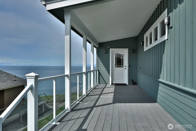 balcony featuring a water view