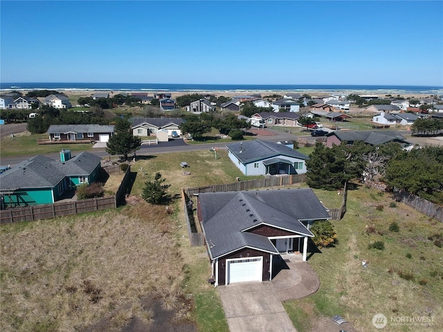 birds eye view of property with a residential view