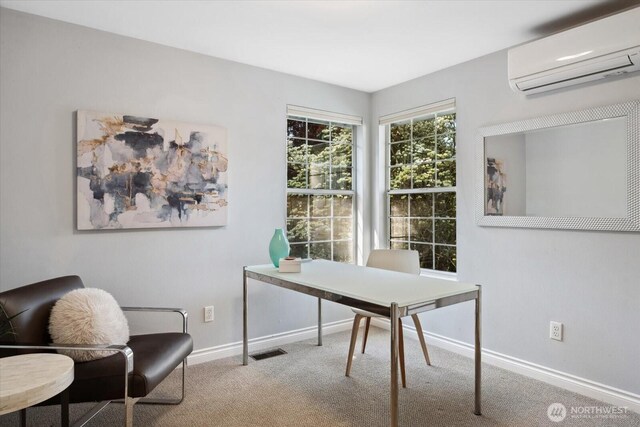 carpeted home office with baseboards, a wall unit AC, and visible vents