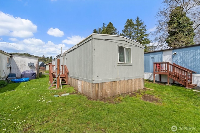 view of property exterior with a yard