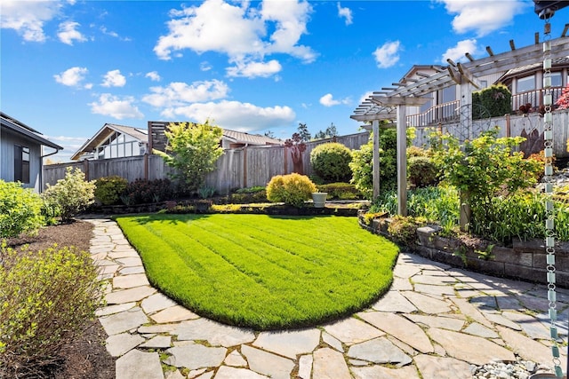 view of yard with a fenced backyard and a pergola
