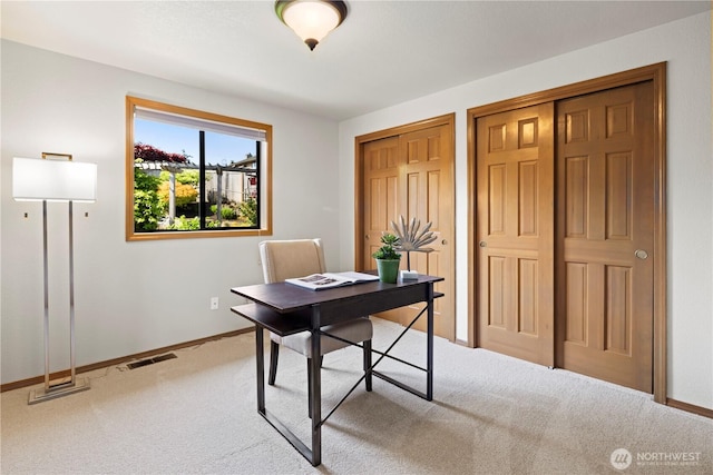 office with baseboards, carpet floors, and visible vents