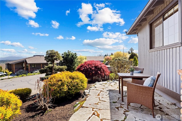 view of patio featuring outdoor dining area