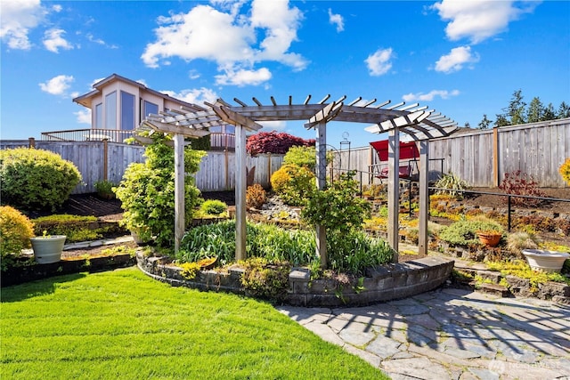 view of yard featuring fence and a pergola