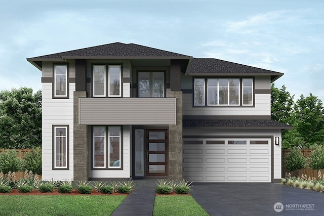 prairie-style home with an attached garage, fence, roof with shingles, and driveway