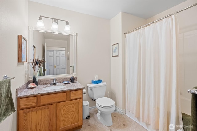 full bathroom with toilet, curtained shower, tile patterned flooring, and vanity
