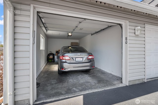 garage featuring a garage door opener