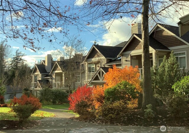 view of property exterior with a chimney