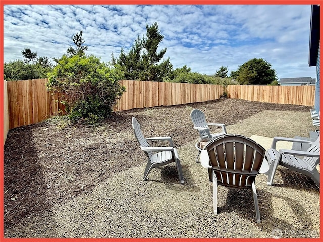 923 Ocean Shores Blvd SW, Ocean Shores, WA 98569 - fenced backyard featuring a patio area