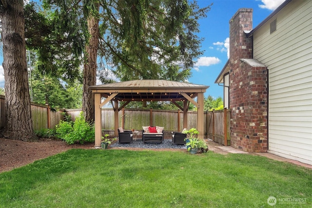 view of yard with an outdoor hangout area and a gazebo