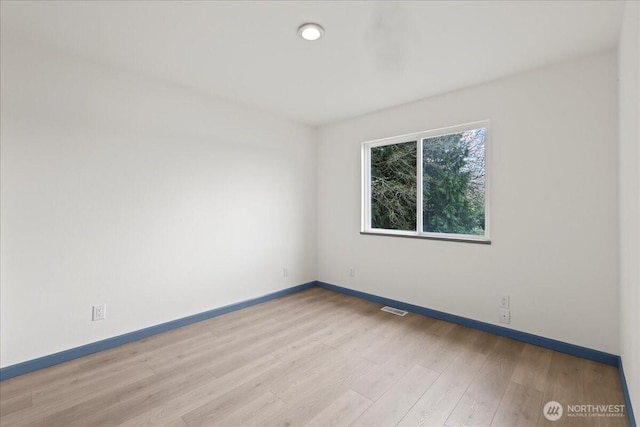 9360 SE Southworth Dr, Port Orchard, WA 98366 - unfurnished room featuring visible vents, baseboards, and wood finished floors