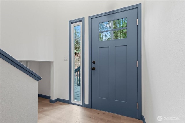 9360 SE Southworth Dr, Port Orchard, WA 98366 - interior space featuring light wood-type flooring and baseboards