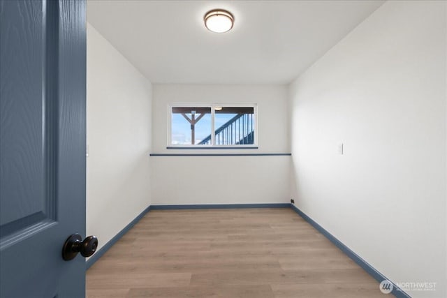 9360 SE Southworth Dr, Port Orchard, WA 98366 - spare room featuring light wood-type flooring and baseboards