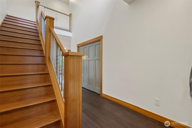 8996 Dearborn Ave, Blaine, WA 98230 - stairs with baseboards, wood finished floors, and a high ceiling