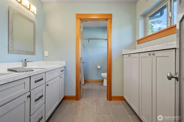 8996 Dearborn Ave, Blaine, WA 98230 - bathroom featuring baseboards, tile patterned flooring, toilet, and vanity