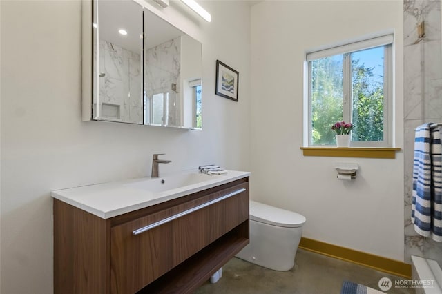 8996 Dearborn Ave, Blaine, WA 98230 - bathroom featuring vanity, a marble finish shower, baseboards, and toilet