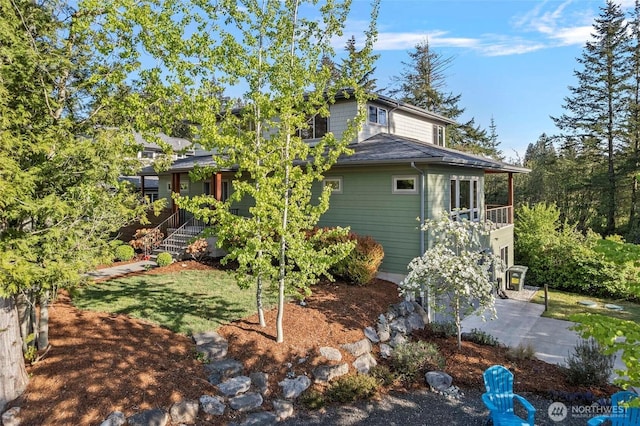8996 Dearborn Ave, Blaine, WA 98230 - view of home's exterior with stairs and a shingled roof