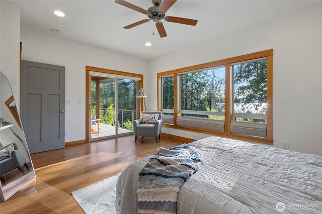 8996 Dearborn Ave, Blaine, WA 98230 - bedroom with wood finished floors, baseboards, access to outside, recessed lighting, and a ceiling fan
