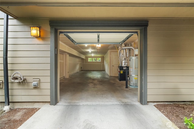 garage featuring a garage door opener and gas water heater