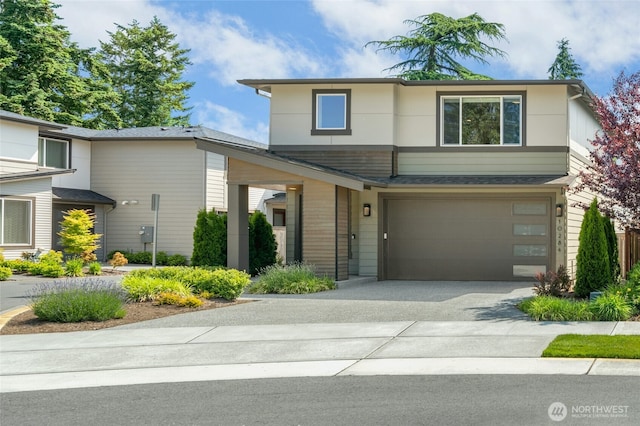 10284 133rd Ct NE, Redmond, WA 98033 - view of front of property with asphalt driveway and a garage