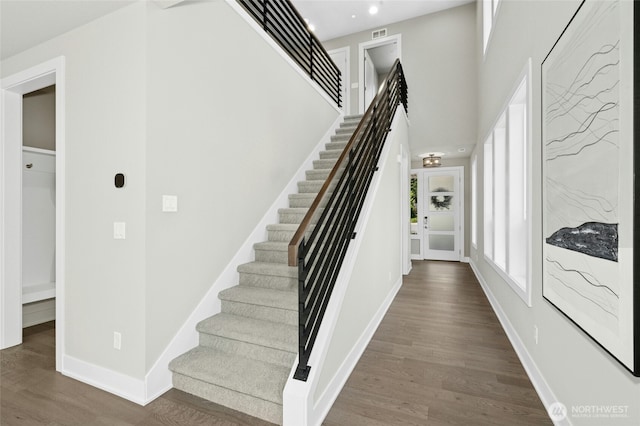 10284 133rd Ct NE, Redmond, WA 98033 - staircase featuring wood finished floors, baseboards, and recessed lighting