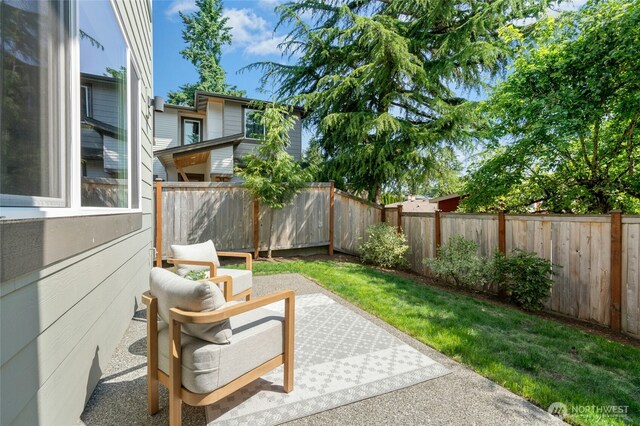 10284 133rd Ct NE, Redmond, WA 98033 - fenced backyard featuring a patio