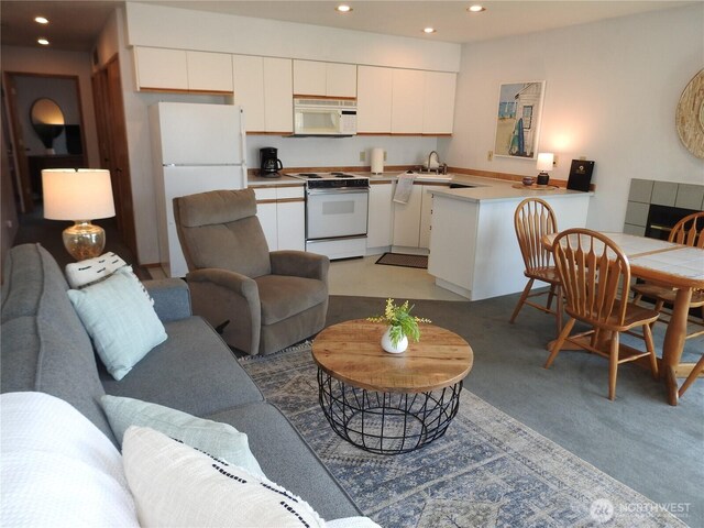 100 Lake Chelan Shores Dr Unit 18-9, Chelan, WA 98816 - living room with recessed lighting and light carpet