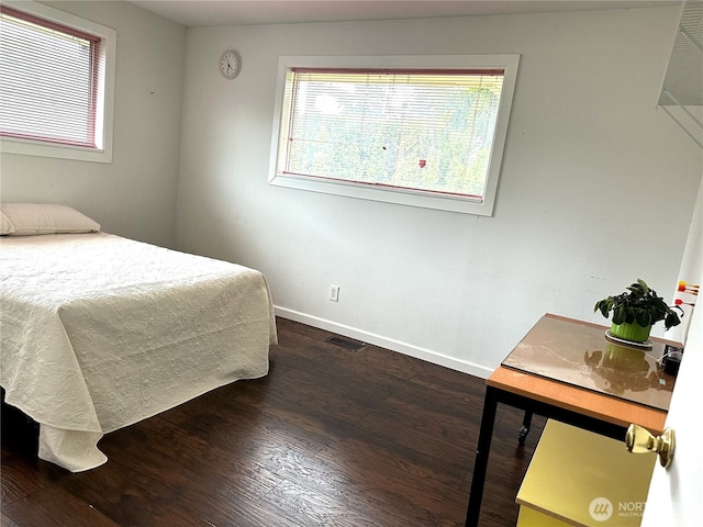 810 SW 356th St, Federal Way, WA 98023 - bedroom with dark wood-type flooring and baseboards