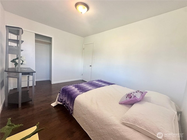 810 SW 356th St, Federal Way, WA 98023 - bedroom featuring wood finished floors, baseboards, and a closet