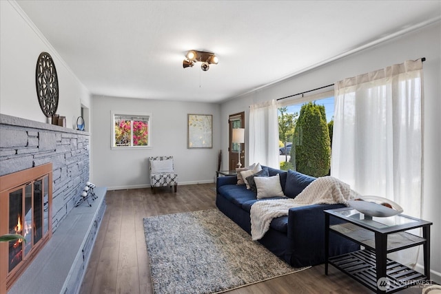 626 Legion Dr, Everett, WA 98201 - living room with a fireplace, wood-type flooring, and baseboards