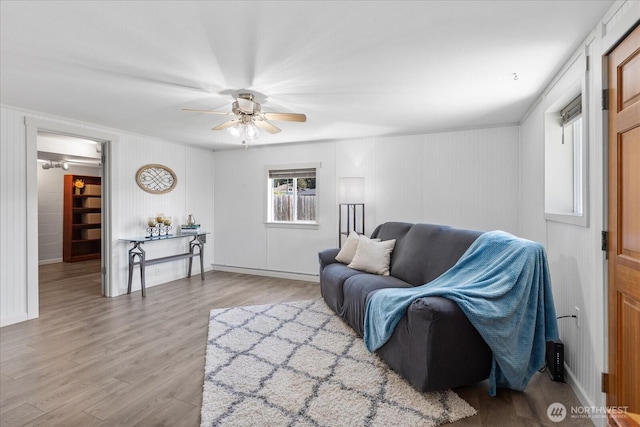 626 Legion Dr, Everett, WA 98201 - living room with wood finished floors, a ceiling fan, and baseboards