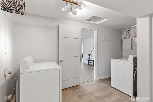 626 Legion Dr, Everett, WA 98201 - washroom featuring washer and clothes dryer and light wood-style flooring