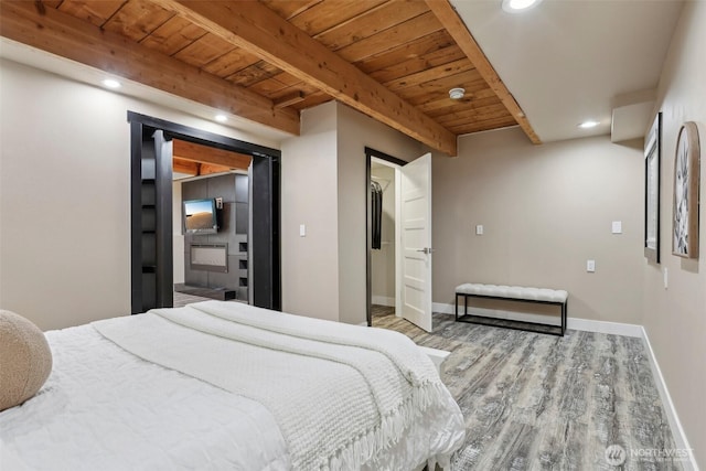 320 SW Forest Dr, Issaquah, WA 98027 - bedroom with wood ceiling with exposed beams, wood finished floors, recessed lighting, and baseboards