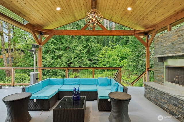 320 SW Forest Dr, Issaquah, WA 98027 - view of patio with a gazebo and an outdoor living space with a fireplace