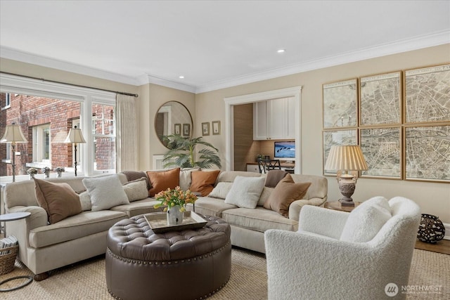 living room with recessed lighting and ornamental molding