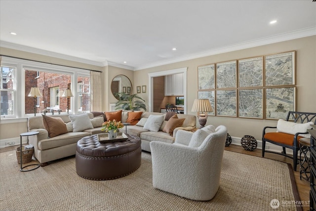 living area with wood finished floors, baseboards, recessed lighting, and crown molding