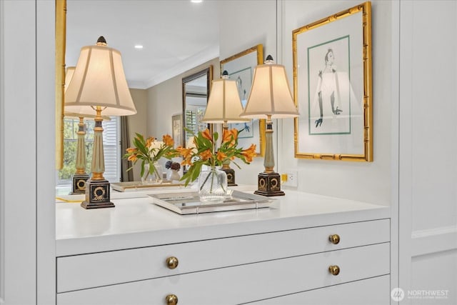 interior space featuring ornamental molding and recessed lighting