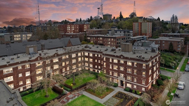 birds eye view of property featuring a city view