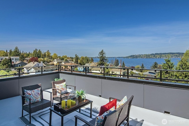8536 S 114th St, Seattle, WA 98178 - balcony featuring a water view and an outdoor hangout area