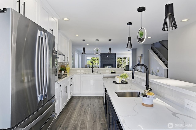 8536 S 114th St, Seattle, WA 98178 - kitchen featuring a sink, white cabinets, appliances with stainless steel finishes, and dark wood-style floors
